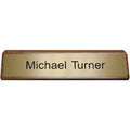 K81 - Plastic Nameplate Mounted on Wood 2" x 10"