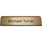 K81 - Plastic Nameplate Mounted on Wood 2" x 10"