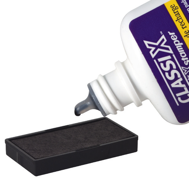 Adding drops of ClassiX refill ink onto the removed ink pad