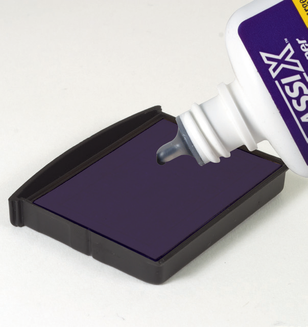 Adding drops of ClassiX refill ink onto the removed ink pad