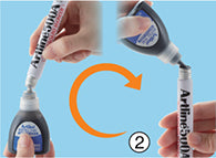 Inserting the refill ink nozzle into the Artline whiteboard marker